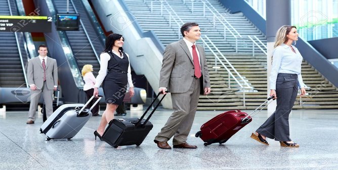 rsz 13663434 group of business people at the airport stock photo