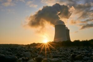 low angle photo of nuclear power plant buildings emtting 3044470