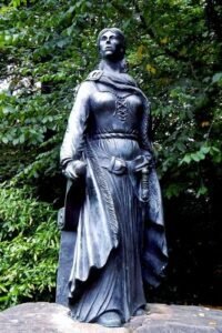 Grainne Mhaol Ni Mhaille statue at Westport House Co. Mayo Ireland by Suzanne Mischyshyn e1616781027989